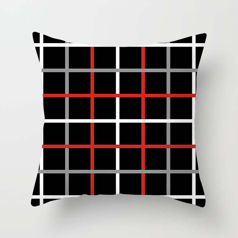 Decorative pillow for sofa featuring a modern plaid design in black, red, and gray for stylish home decor.