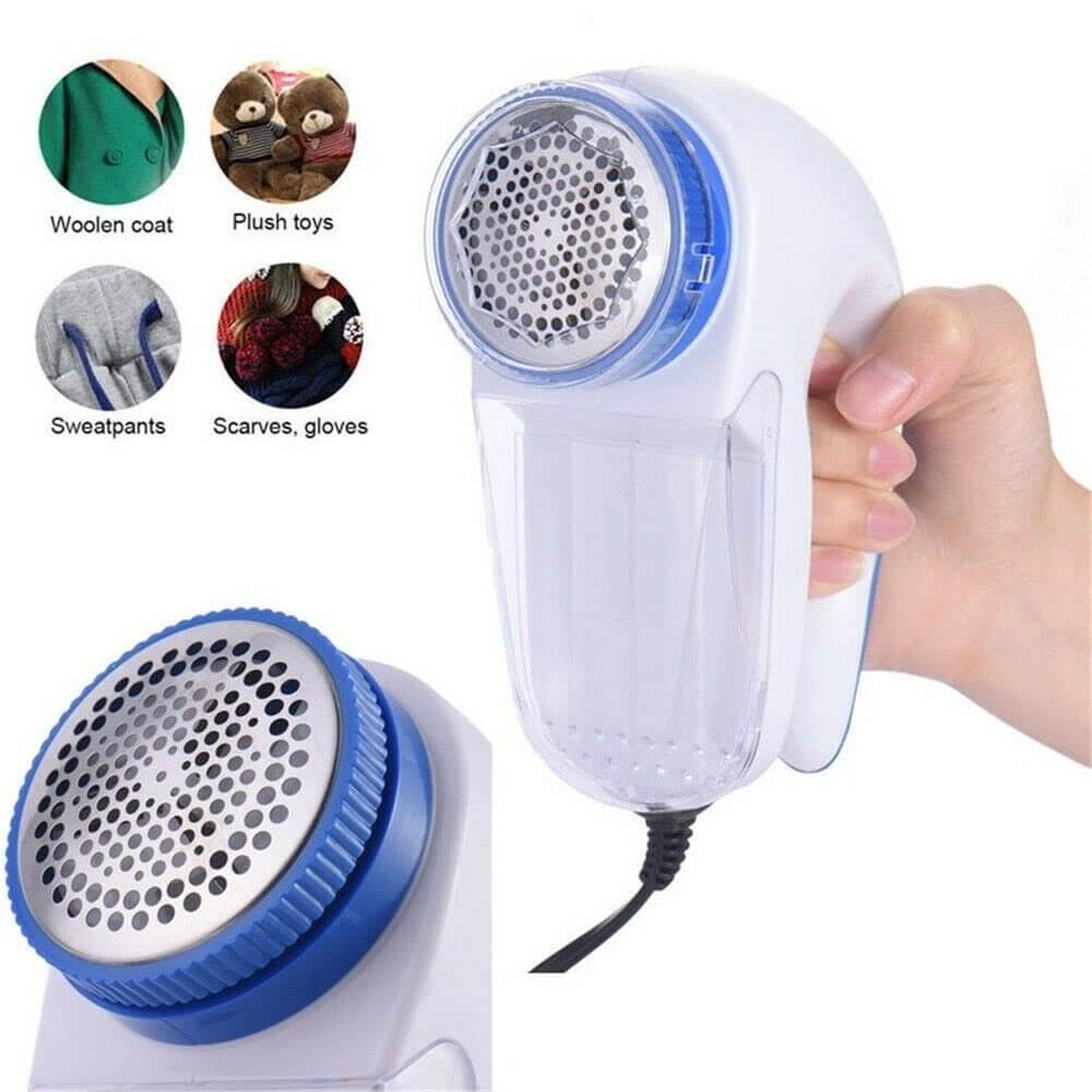 Lint Fabric Remover handheld device for removing fuzz, pet hair and lint from clothes and fabrics.