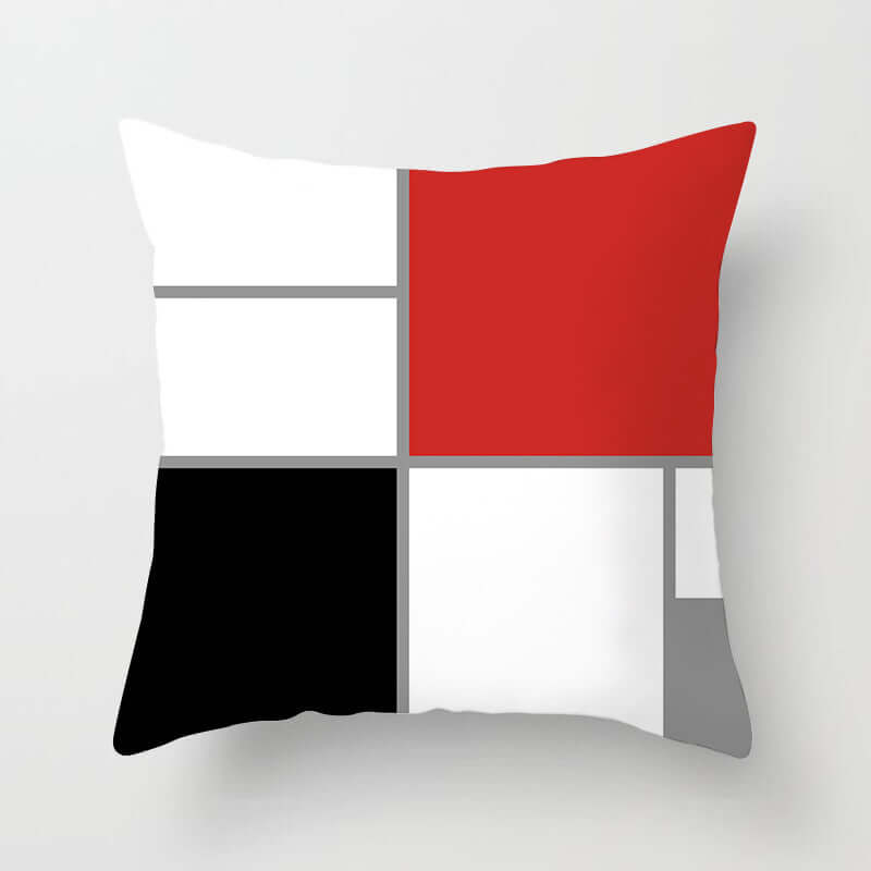 Modern decorative pillow for sofa featuring a geometric design with red, black, white, and gray accents.