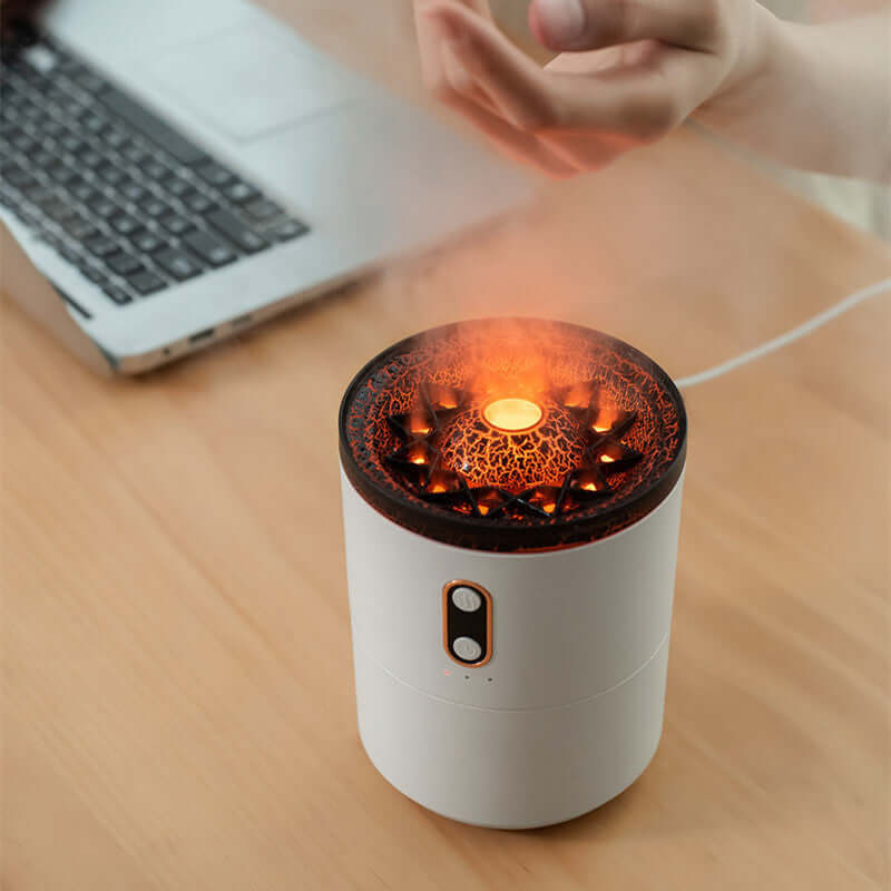 Volcano Air Humidifier emitting mist on desk, enhancing air quality and decor with stylish design and aromatherapy benefits.