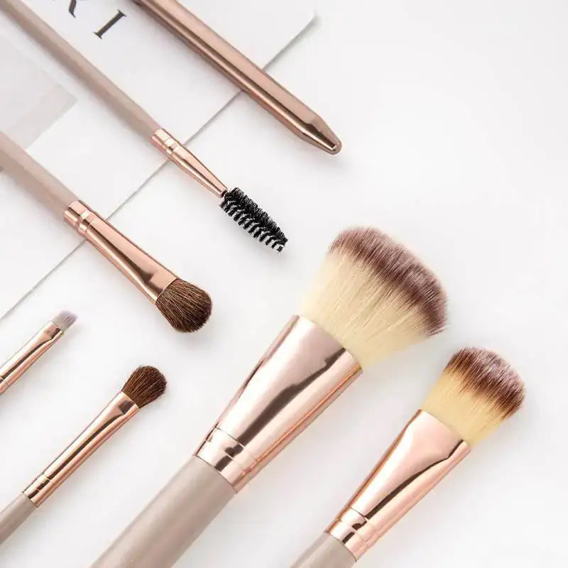 OmyBrush professional makeup brush kit with premium leather case for flawless application and seamless blending.