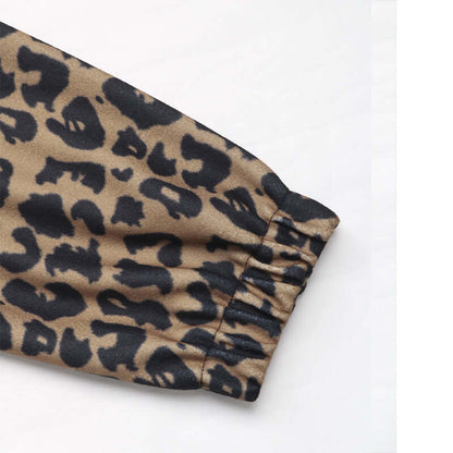 Close-up of a sleeve on a cheetah print woolen coat, showcasing its elegant leopard pattern and premium craftsmanship.