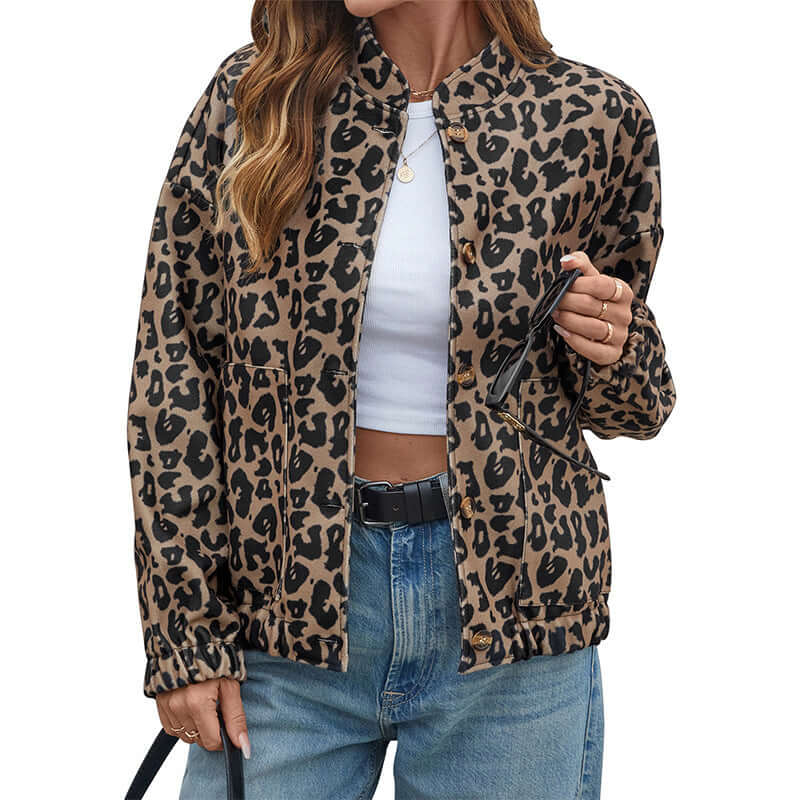 Woman wearing chic Cheetah Print Coat in leopard pattern, crafted from soft woolen fabric, perfect for fashion-forward outfits.