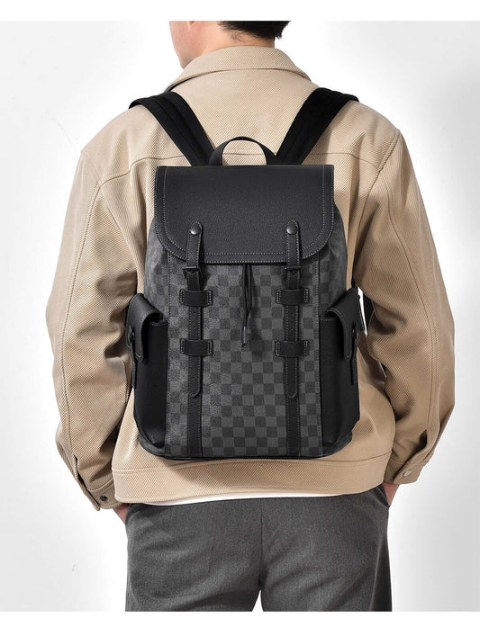 Man carrying a stylish business travel backpack featuring a durable PVC design and spacious compartments