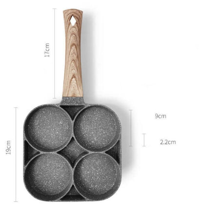 Four Hole Frying Pan with a wooden handle, perfect for cooking multiple dishes simultaneously in your kitchen.