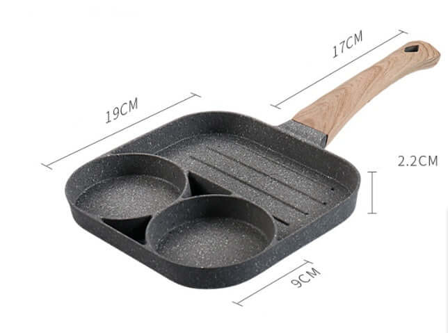 Four Hole Frying Pan with two egg-shaped holes and wooden handle for versatile cooking.