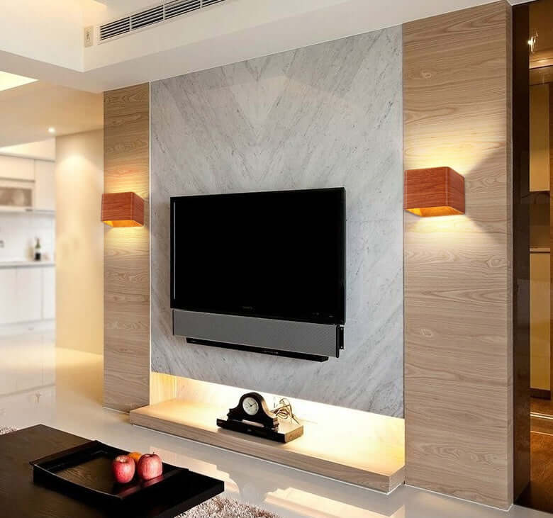 Stylish indoor wall mounted lamps illuminating a modern living room with a sleek TV setup and minimalistic decor.