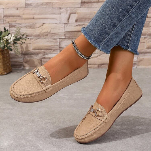 Khaki Ladies Comfortable Loafers with solid color design on feet wearing jeans, featuring low top artificial PU material.