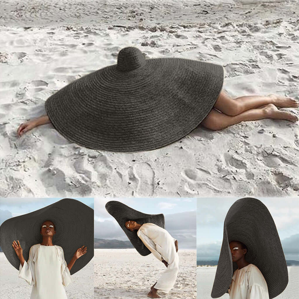 Ladies Straw Sun Hat showcased on the beach, providing stylish sun protection for summer adventures.