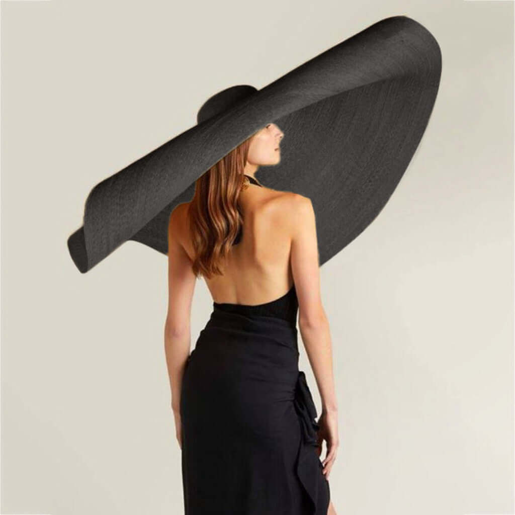 Elegant ladies straw sun hat with wide brim, perfect for summer outings and stylish sun protection.
