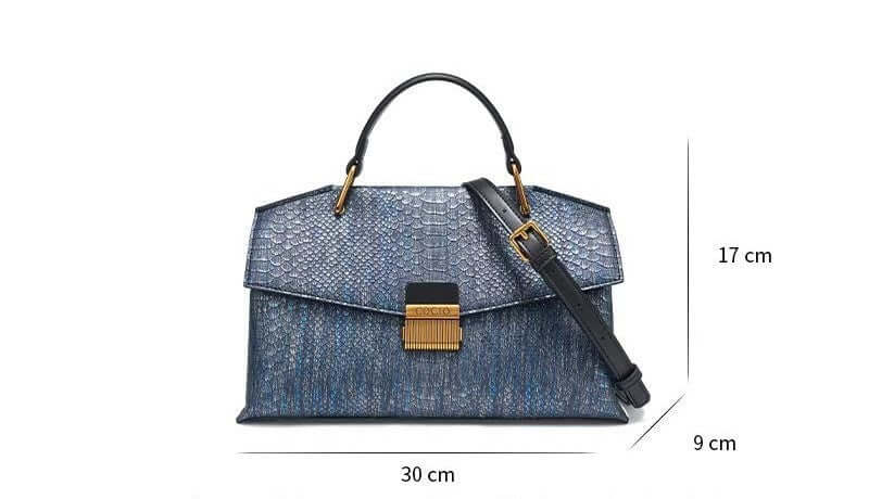 Elegant Ladies Leather Handbag with a luxurious cowhide exterior, horizontal design, 30cm width, 17cm height, and 9cm depth.