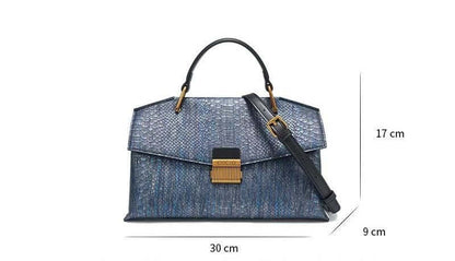 Elegant Ladies Leather Handbag with a luxurious cowhide exterior, horizontal design, 30cm width, 17cm height, and 9cm depth.