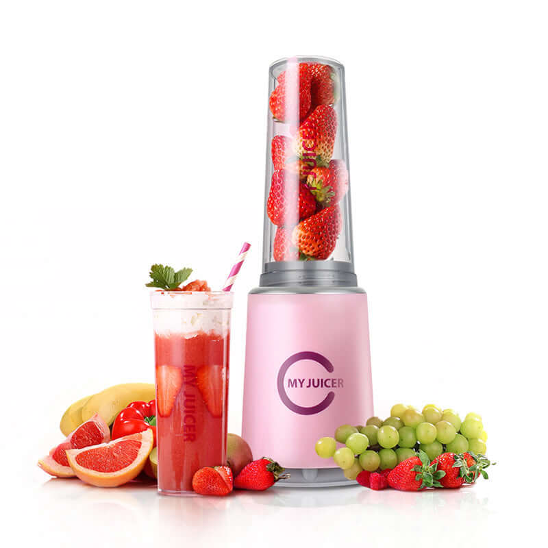 Multi Function Juicer with fresh strawberries and mixed fruits, ideal for making healthy juice; includes juice glass and fruit display.