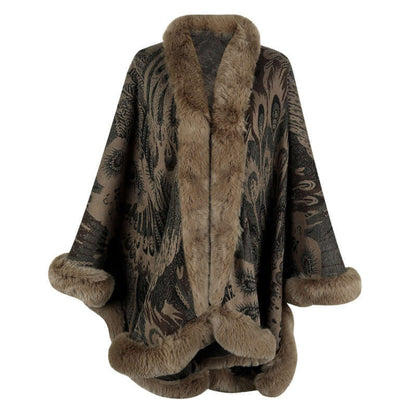 Luxurious patterned shawl with faux fur trim, perfect for winter style and warmth.