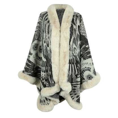 Elegant patterned shawl with faux fur trim, perfect for adding style and warmth to your winter wardrobe.