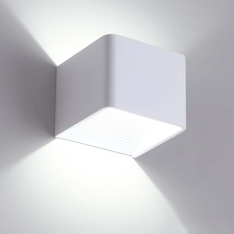 Modern Indoor Wall Mounted Lamp illuminating a wall with a sleek, minimalist design.