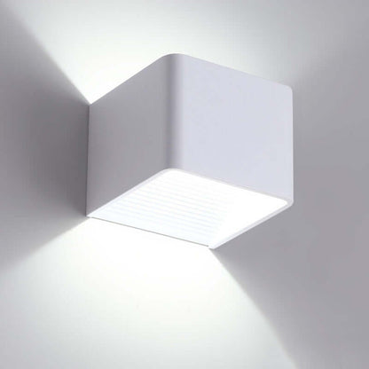 Modern Indoor Wall Mounted Lamp illuminating a wall with a sleek, minimalist design.