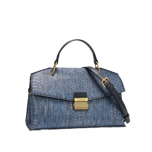 Elegant ladies leather handbag in textured blue with a top handle and adjustable strap, ideal for stylish daily use.
