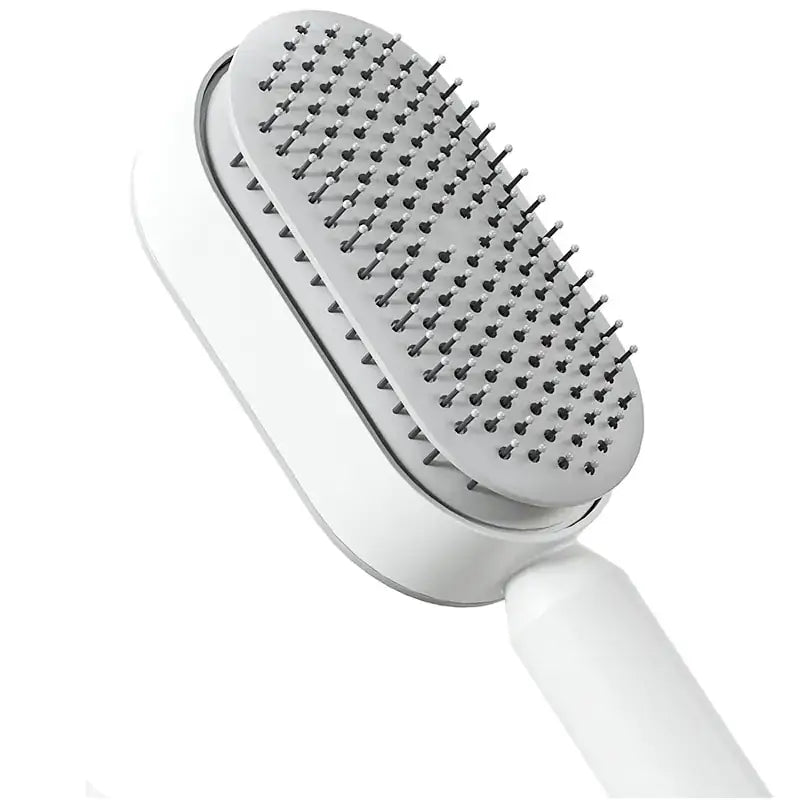 Self-cleaning hairbrush for women with airbag massage function, effortlessly detangling hair, leaving the brush fresh for every use.